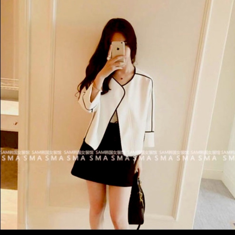 Beautiful elegant blazer white with black.